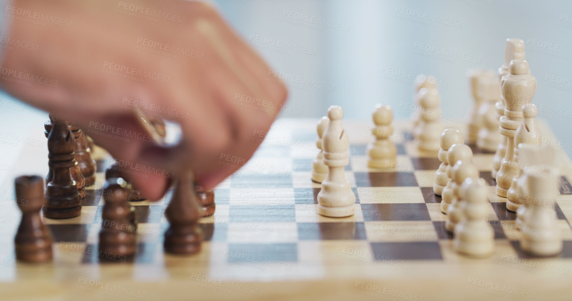 Buy stock photo Chess, playing and hand of person on pawn for challenge, problem solving and competition on table. Chessboard, player and moving piece in home with strategic decision, game plan and skill development
