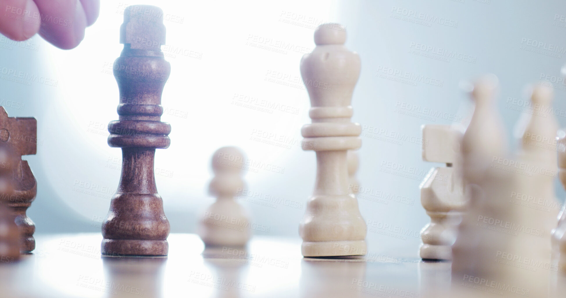 Buy stock photo Chess, playing and hand of person with decision for challenge, problem solving and competition. Chessboard, player and piece in home with strategic hobby, game plan and skill development with flare