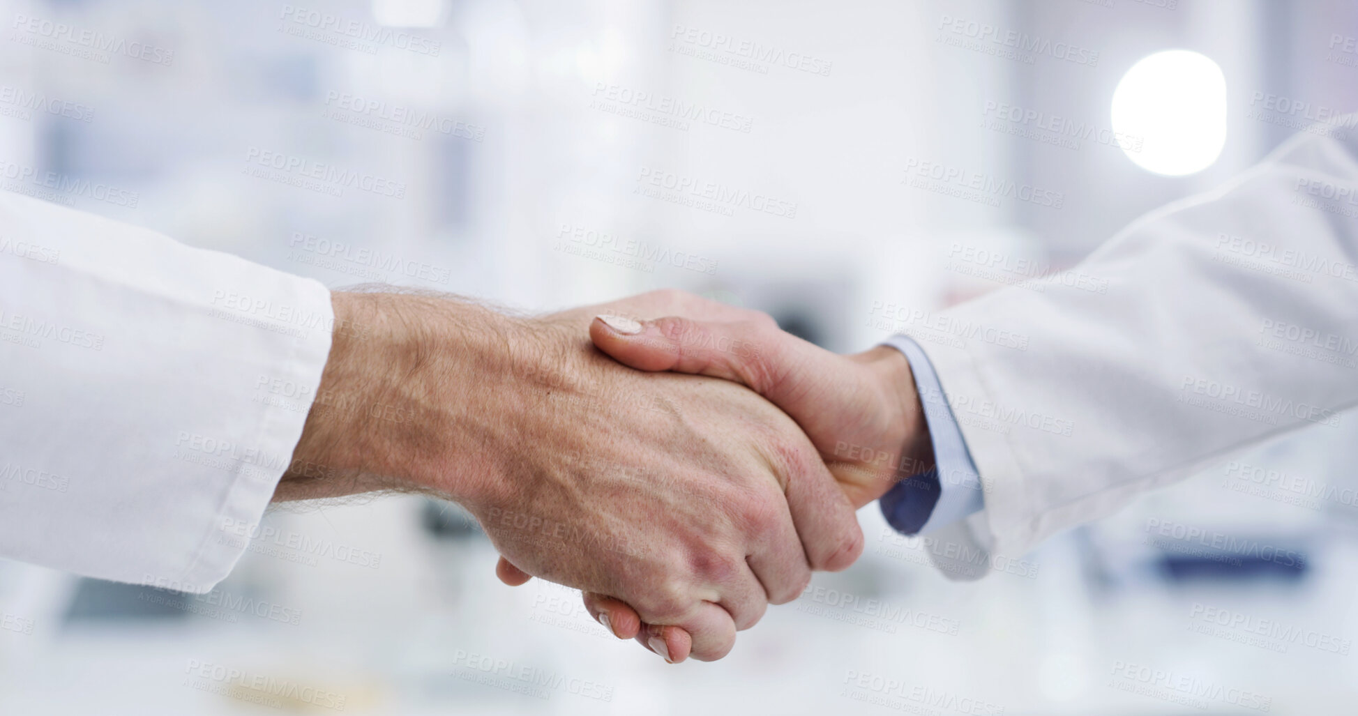 Buy stock photo People, doctor and meeting with handshake for partnership, agreement or teamwork in hospital. Closeup, employees or healthcare workers shaking hands with b2b for deal, collaboration or commitment