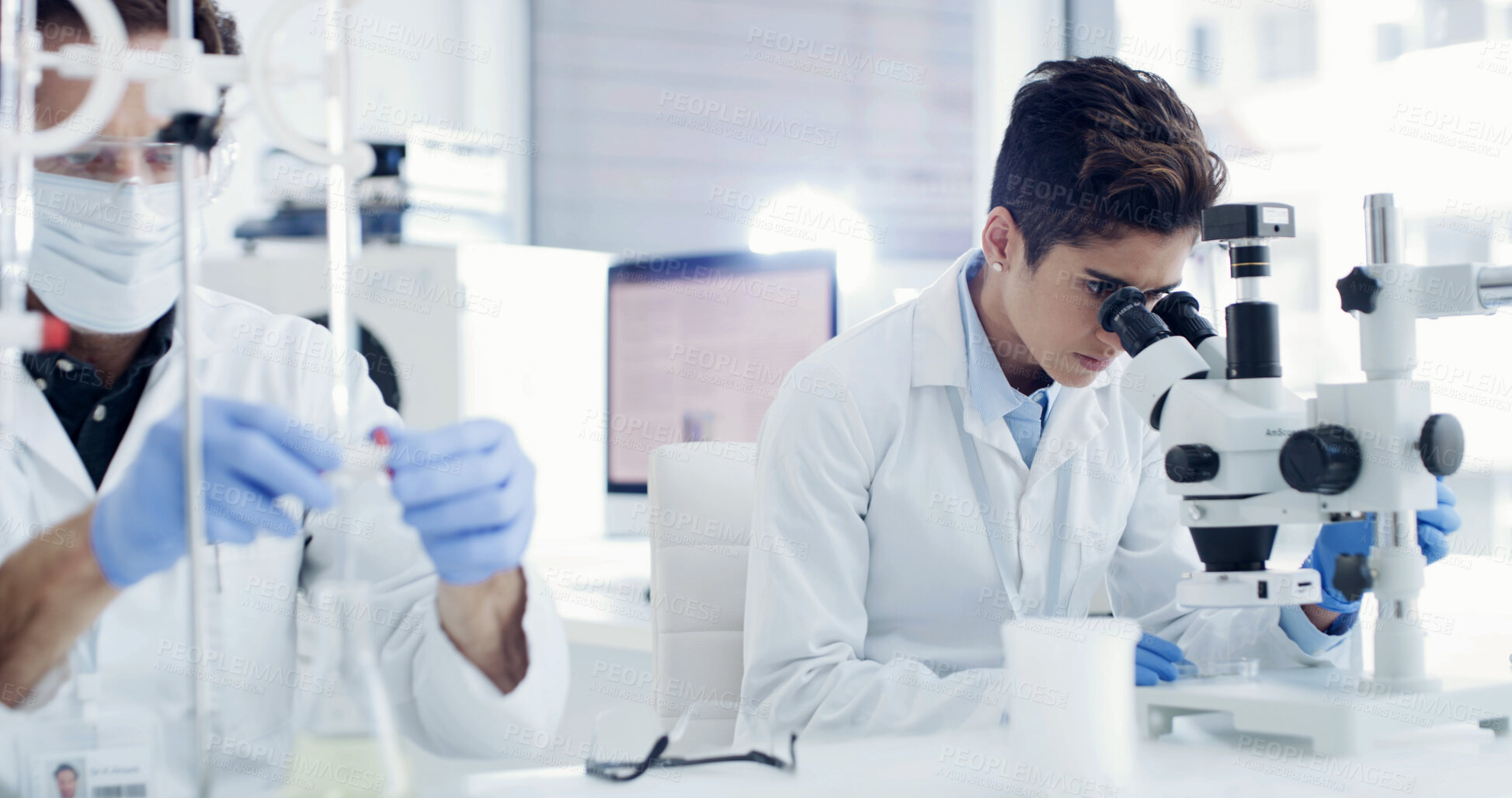 Buy stock photo Woman, scientist and team with microscope at lab for medical research, particles and virus cure. People, science and equipment for bacteria, sample analysis and collaboration for vaccine development