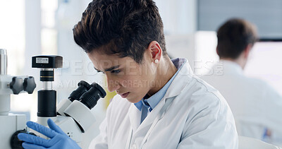 Buy stock photo Woman, scientist and microscope at laboratory for particles, sample or medical research for virus cure. Person, science and pharmaceutical study with gear, bacteria analysis and vaccine development