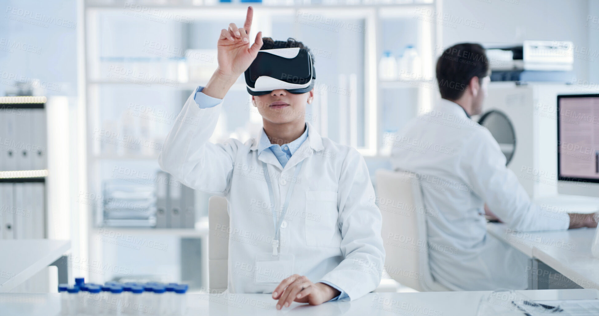 Buy stock photo Lab, scientist and man with Vr glasses, pointing and futuristic tech for medical research and study. Science, innovation and person with eyewear for 3D vision, virtual reality or metaverse in clinic