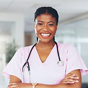 Doctor, woman and happy with arms crossed in clinic for pediatric help ...