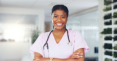 Buy stock photo Doctor, woman and happy with arms crossed in clinic for pediatric help, medical service or about us. Pediatrician, black person or healthcare portrait in hospital for career trust or health integrity