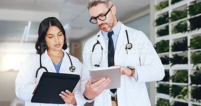 Buy stock photo Hospital, meeting and doctors on tablet with online report, patient results and treatment plan. Healthcare, collaboration and man and woman on tech for medical research, surgery schedule and advice
