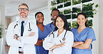 Medical, team and happy with arms crossed in clinic for health support, career pride and about us. People, doctors and nurses with group portrait in hospital for healthcare integrity, trust and smile