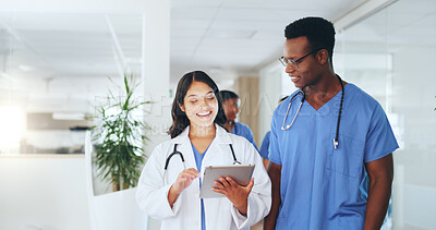 Buy stock photo Walking, meeting and doctors on tablet in hospital for report, patient results and treatment plan. Healthcare, teamwork and man with woman on tech for medical research, surgery schedule and advice