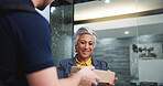 Box, office and mature woman with delivery man for package distribution, stock order and logistics. People, female professional and happy with parcel for work supplies, courier service and ecommerce