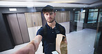 Delivery man, ring bell and package at front door with pov, service and ecommerce with glass in lobby. Person, courier and paper bag with order, online shopping and shipping with product in hallway