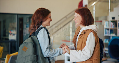 Buy stock photo Education, greeting and holding hands with girl friends on high school campus for development. Excited, learning and smile of teen students in hallway together for academic future, bonding or study