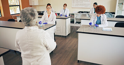 Buy stock photo Educator, students and communication in classroom for education, science lesson and explain chemistry. Learning, people and teenagers listen for physics lecture, knowledge and lab experiment guidance