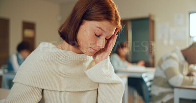 Buy stock photo Education, headache and stress with girl student in class for college or university examination. Anxiety, brain fog and learning with teen learner in classroom on campus for assessment or test