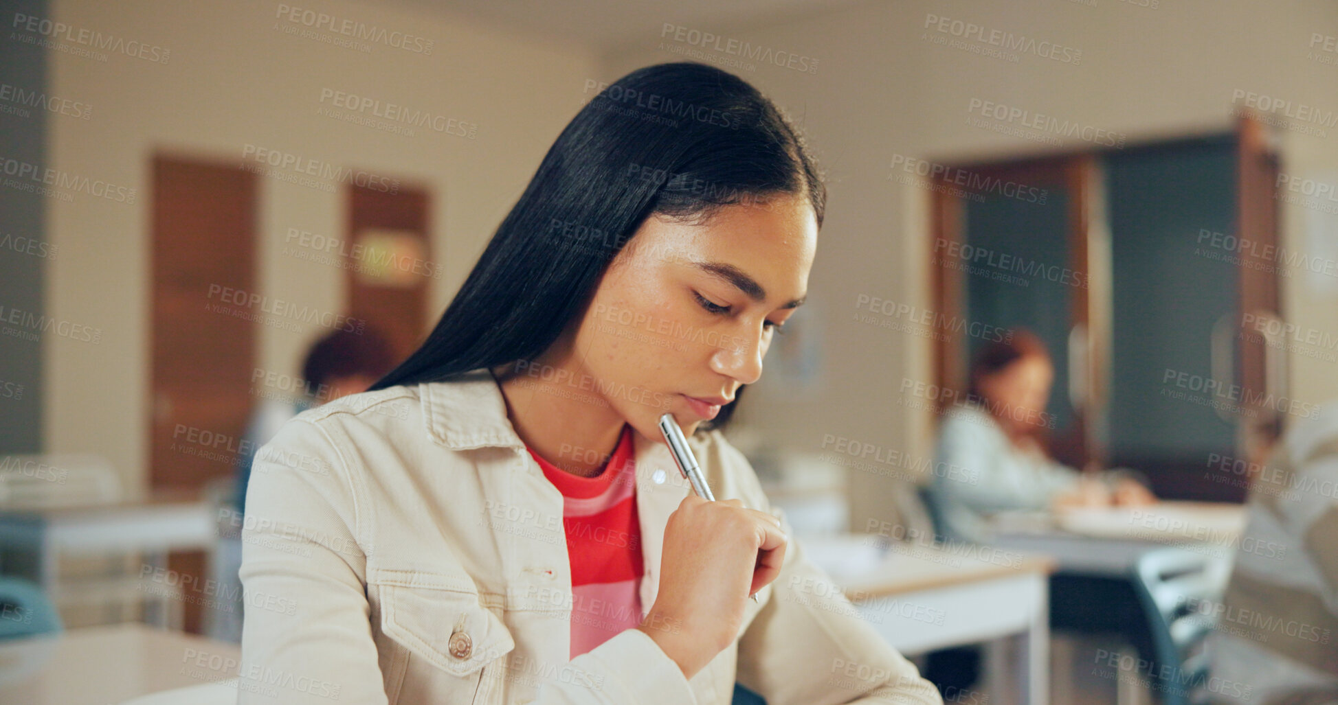 Buy stock photo Girl, thinking or test in high school with pen for math quiz question, knowledge or skill development. Teenager, student and reflection in classroom with problem solving, calculus exam or curriculum.
