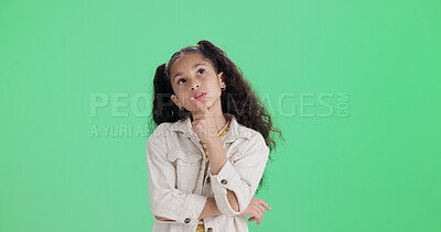 Buy stock photo Thinking, child and student for education in studio with vision, planning and ideas for learning. Mockup space, kid and brainstorming for solution, question decision and knowledge on green background