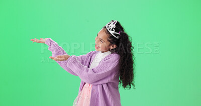 Buy stock photo Costume, pointing and princess with girl on green screen background for dress up announcement. Crown, hand gesture and smile of female child isolated on studio mockup space for deal or notification