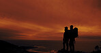 Sunset, silhouette and friends hiking on mountain with space for vacation, adventure or holiday. Travel, shadow and men with backpacking on weekend trip with break for trekking together in nature.