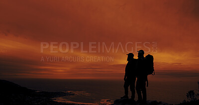 Buy stock photo Sunset, silhouette and friends hiking on mountain with space for vacation, adventure or holiday. Travel, shadow and men with backpacking on weekend trip with break for trekking together in nature.