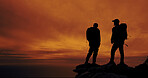 Sunset, silhouette and men hiking on mountain with space for vacation, adventure or holiday. Travel, shadow and friends with backpacking on weekend trip with break for trekking together in nature.