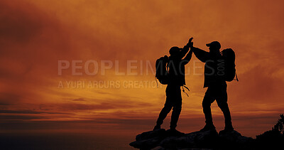Buy stock photo Sunset, silhouette and friends with high five for hike on mountain for vacation, adventure or holiday. Space, sky and shadow of men with celebration for backpacking goal on weekend trip for trekking.
