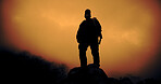 Sunset, hiking and man on mountain for travel, reflection and vacation with low angle for view. Trekking, backpacking and person in nature for holiday, space or thinking while sightseeing