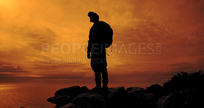 Buy stock photo Sunset, trekking and man on mountain for adventure, reflection and view of ocean on vacation. Hiking, backpacking and person outdoor for holiday, travel and thinking with space for sightseeing