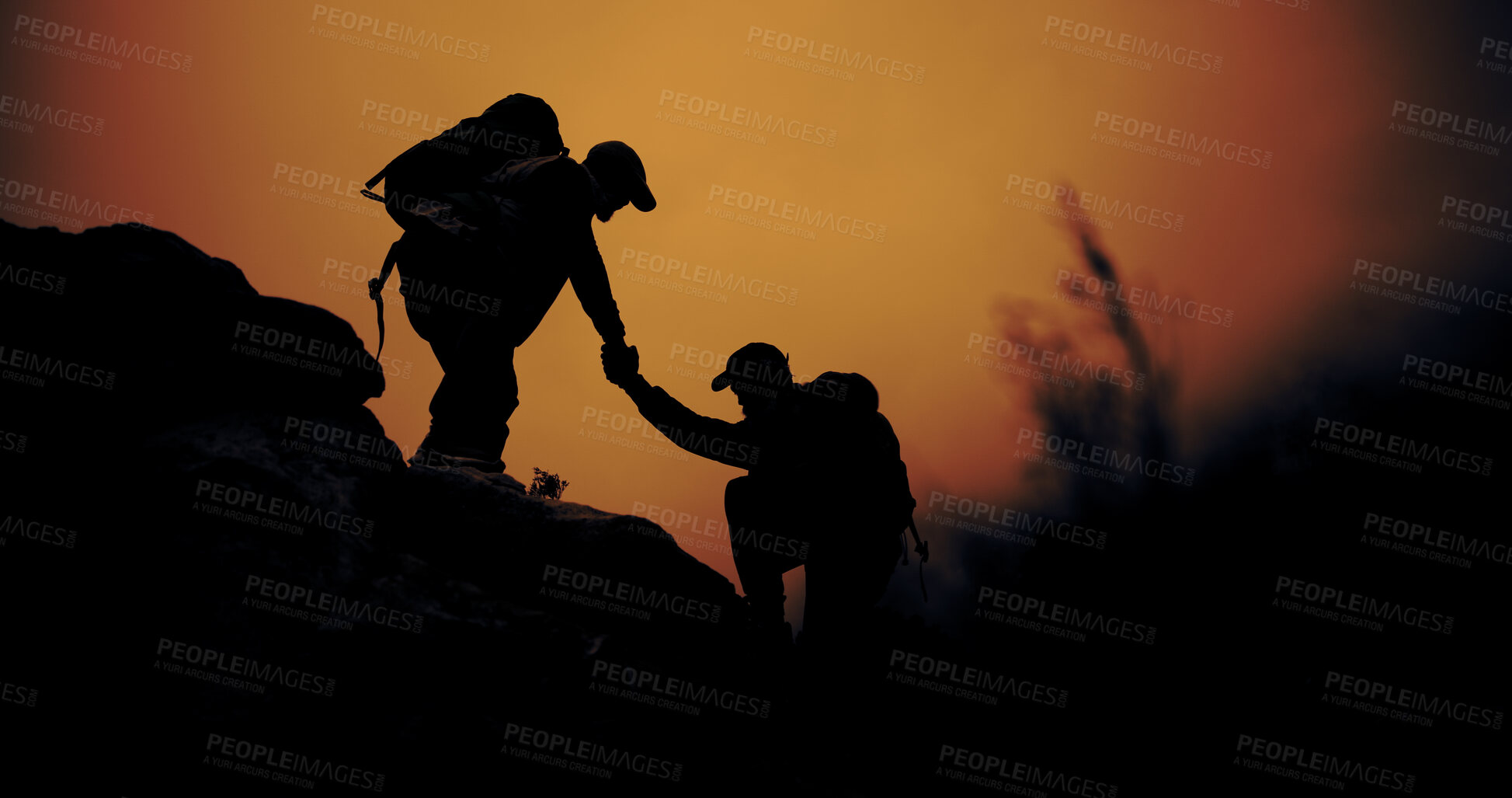Buy stock photo Helping hands, hiking and silhouette of people outdoor for adventure, support or vacation. Trekking, backpacking and assistance with friends for travel together, sunset or teamwork to climb mountain