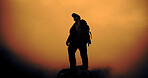 Sunset, hiking and man on mountain for adventure, reflection and view on vacation with low angle. Trekking, backpacking and person outdoor for holiday, travel and thinking with space for sightseeing
