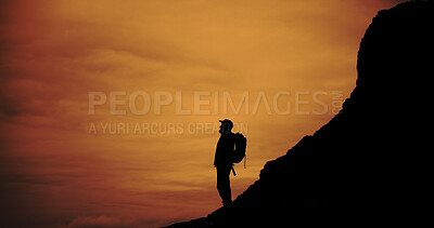 Buy stock photo Outdoor, trekking and silhouette of man on mountain for adventure, reflection and vacation with view. Holiday, backpacking and person hiking at sunset, travel or thinking with space for sightseeing