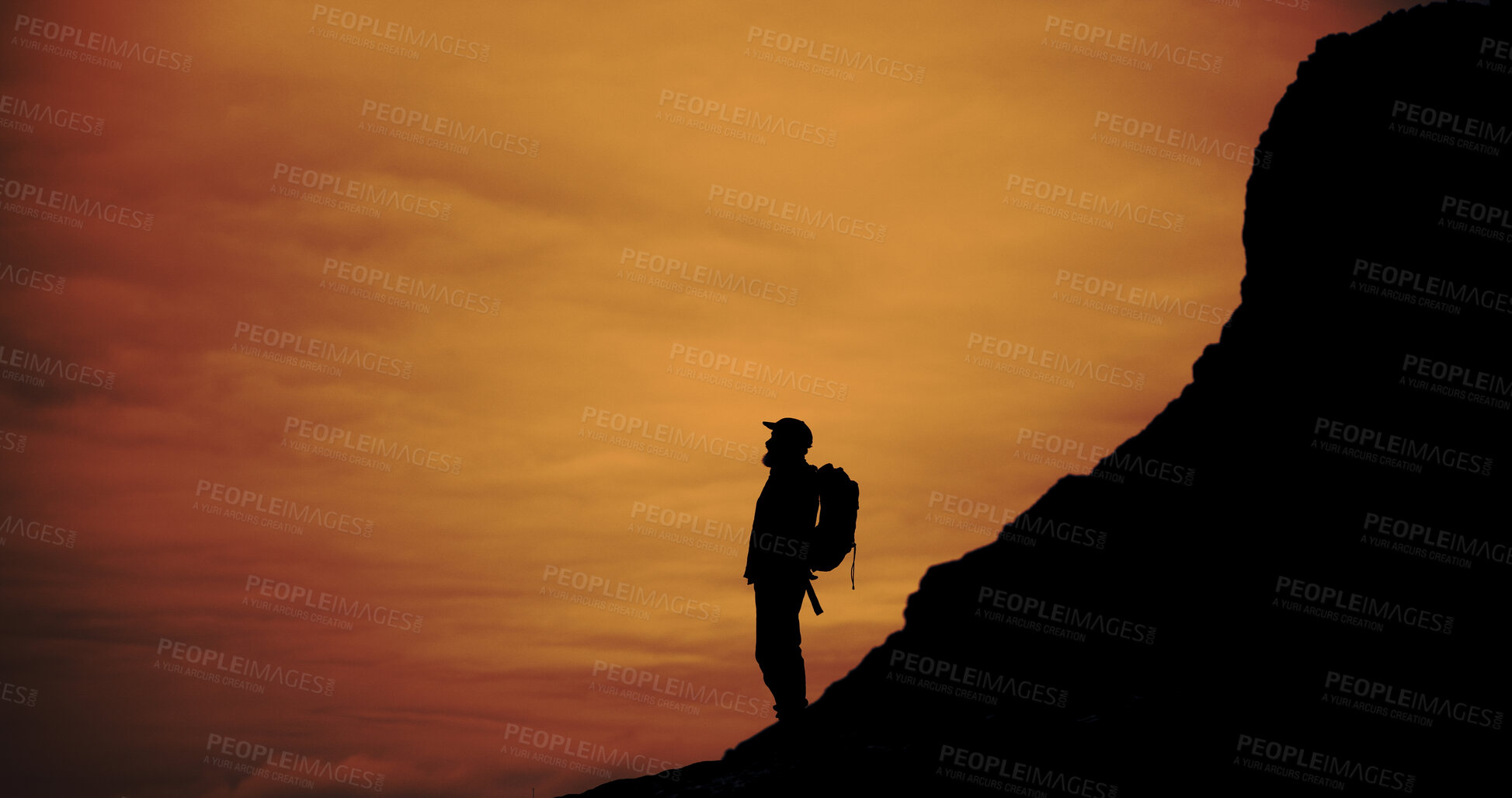 Buy stock photo Outdoor, trekking and silhouette of man on mountain for adventure, reflection and vacation with view. Holiday, backpacking and person hiking at sunset, travel or thinking with space for sightseeing