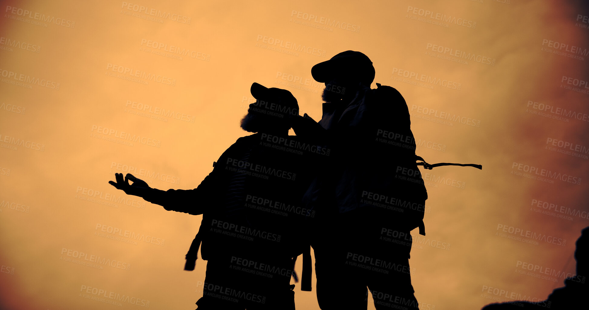 Buy stock photo Mountain, sunset and silhouette of friends with hiking, travel and backpacking with view and below. Shadow, eco tourism and outdoor with evening, nature and fitness or exercise for wellness with men