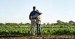 Couple, hug and sustainability in farm, outdoor and support for small business, space or agriculture. Back, entrepreneur and people in countryside for food production, love and embrace with partner