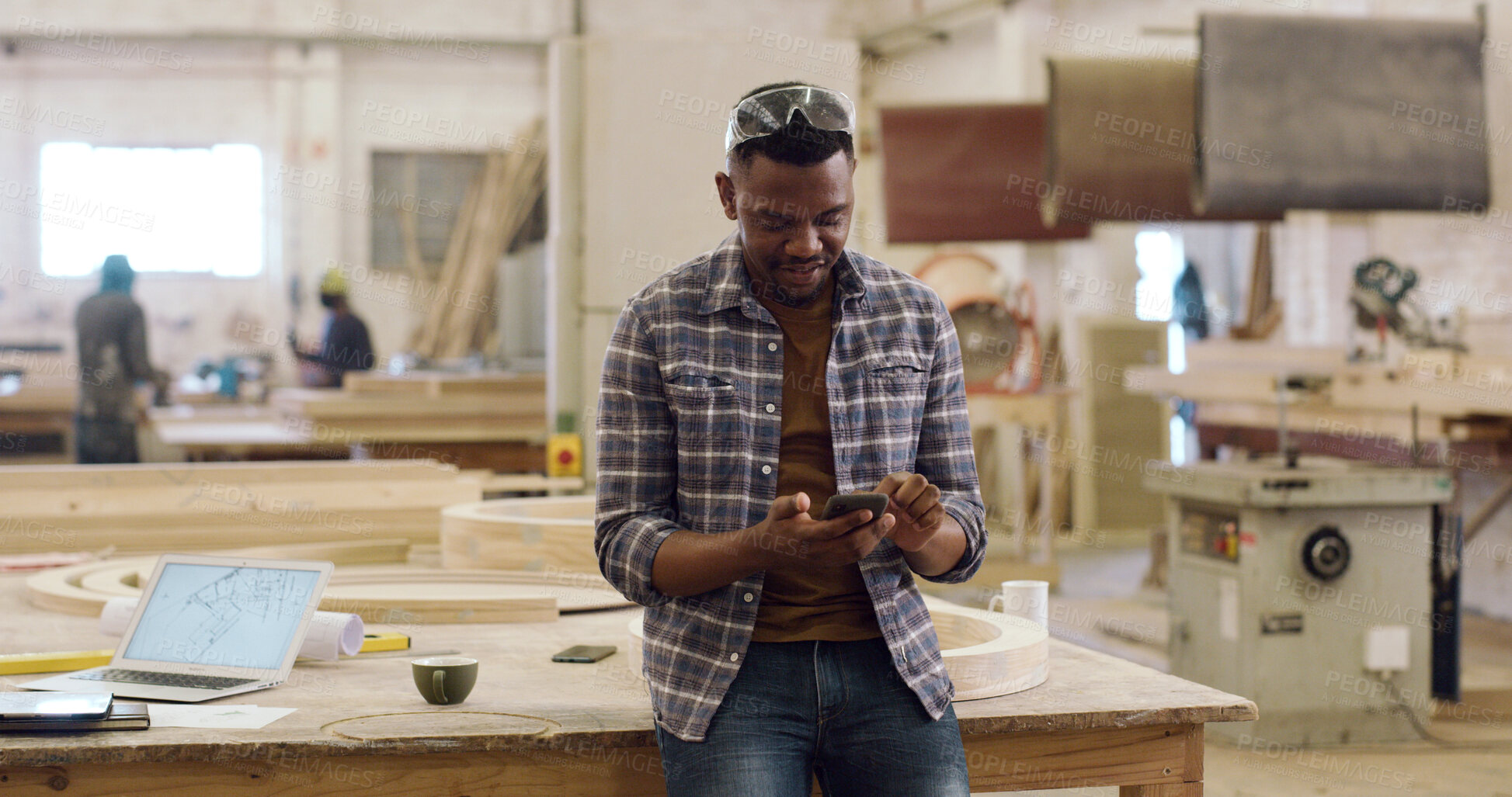 Buy stock photo Carpenter, cellphone and man in workshop, reading and digital app for online chatting. Inventory order, internet or person in factory, smartphone and email for design project and message to contact