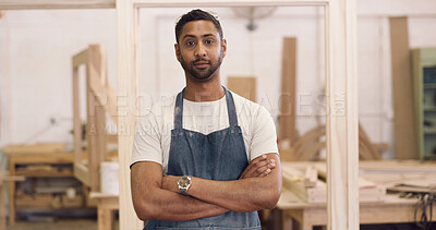 Buy stock photo Portrait, carpenter or man with arms crossed in workshop, furniture production or pride for craftsmanship. Serious, woodworker or artisan with confidence for manufacturing, diy or restoration service