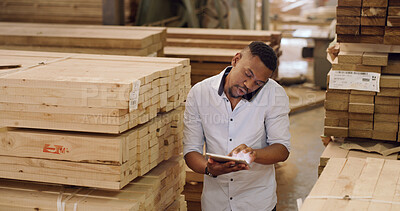 Buy stock photo Carpentry, man and phone call in workshop with tablet, discussion and order timber for woodwork company. Manufacturing, black person and talk in factory with tech, supplier contact and lumber stock.