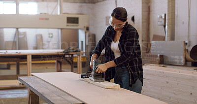 Buy stock photo Carpenter, woman and sanding machine in workshop with woodwork project, furniture production and craft. Artisan, person and manufacturing with glasses, electric tools and carpentry gear for timber.