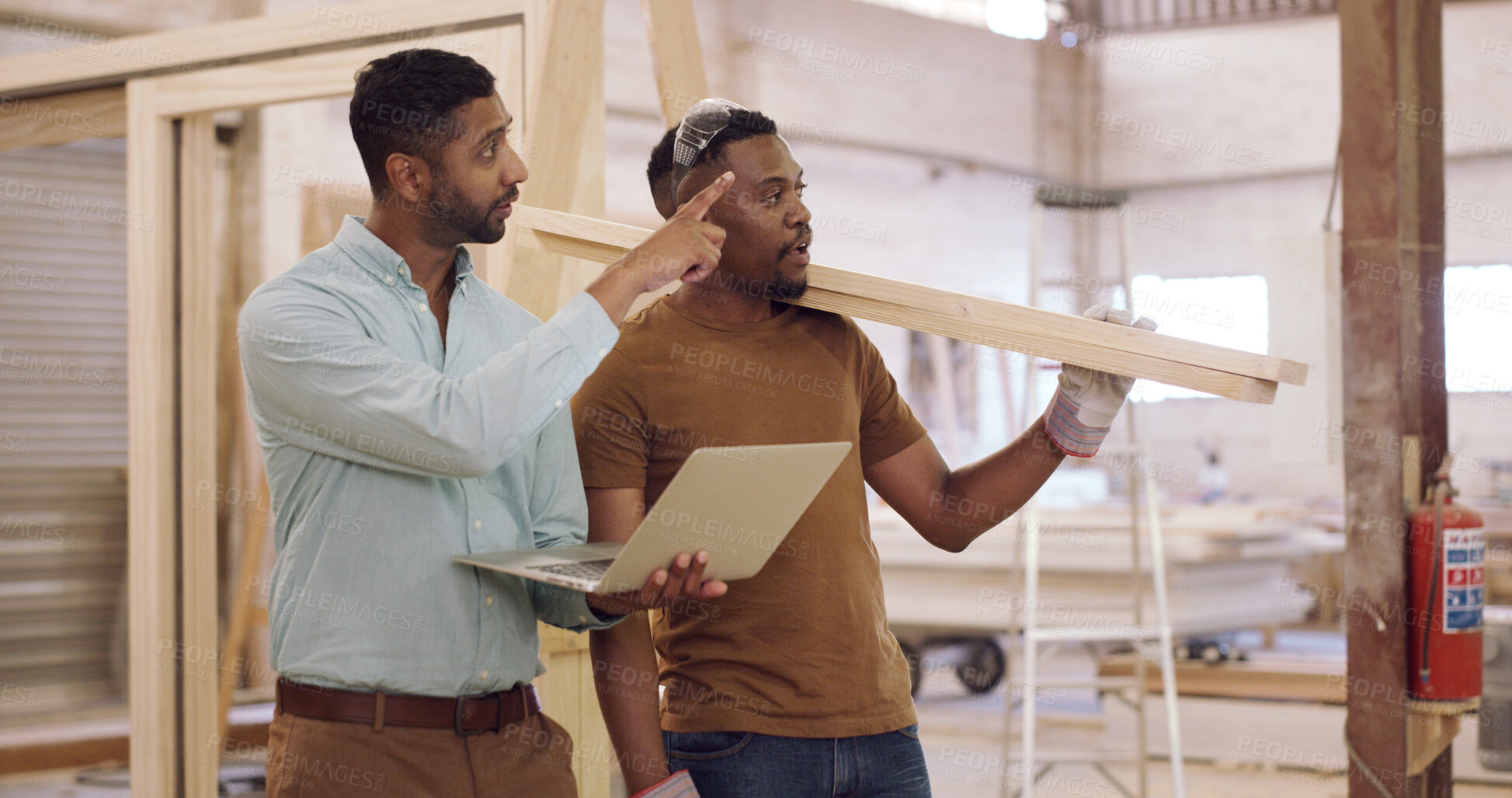 Buy stock photo Carpenter, laptop and men in workshop, talking and planning for inventory management. Advice, supervisor and people in meeting for conversation, tips and tech for production process and manufacturing