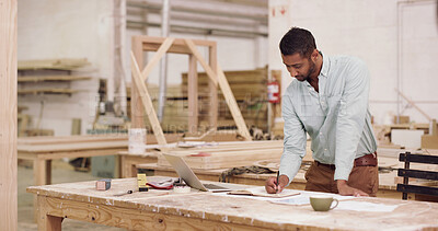 Buy stock photo Carpenter, documents and man in workshop, writing and ideas for project proposal. Furniture restoration, small business or person in factory, manufacturing and lumber inventory for production process