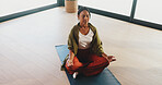 Peace, yoga and woman with meditation in studio for inner peace, grounding practice and zen. Above, mature person and lotus pose on mat for mental health, mindfulness and holistic wellness with space