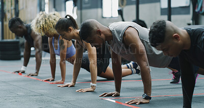 Buy stock photo Fitness, push up and row with people in gym together for class, course or training routine. Balance, exercise and power with athlete group on floor in health club for challenge, wellness or workout