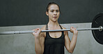 Portrait, fitness and woman with barbell, gym and workout routine for muscle development or wellness. Person, training and bodybuilder with endurance for exercise and weightlifting in health club