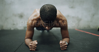 Buy stock photo Fitness, man and plank exercise at gym for strength training, improve posture and core conditioning. Athlete, african person and abdominal workout at health club for endurance challenge and balance