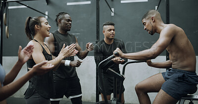 Buy stock photo Applause, people and man with stationary bike in gym, workout and cycling training for fitness motivation. Endurance practice, equipment and crowd clapping for exercise support, active and wellness