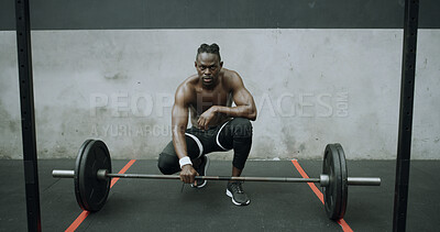 Buy stock photo Black man, portrait and barbell on floor at gym for fitness, confident and strength training. Topless person, body builder and exercise equipment for weightlifting, workout or muscle growth in Kenya