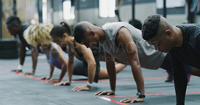 Buy stock photo Exercise, push up and row with people in gym together for class, course or training routine. Balance, power and fitness with athlete group on floor in health club for challenge, wellness or workout