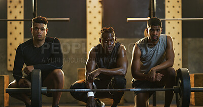 Buy stock photo Fitness, portrait and weight training with men in gym together for commitment or dedication. Barbell, equipment and exercise with group of serious friends in dark health club for challenge or workout