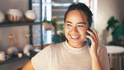 Buy stock photo Phone call, smile or woman in store with pottery, client chat or negotiation with clay supplier. Happiness, networking or Asian owner with tech, discussion or vendor coordination in ceramic business.