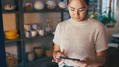 Buy stock photo Planning, search and tablet with woman in pottery boutique for management of small business. App, scrolling and startup with store owner in ceramics gallery for decoration, design or retail sale