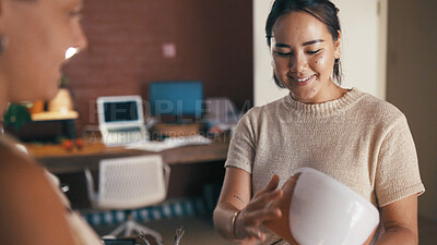 Buy stock photo Customer service, shopping and women with pottery for quality check, help or decision. People, ceramics store and owner with client for sale, smile or retail advice with choice for vase in startup