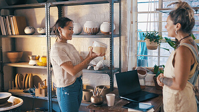 Buy stock photo Customer service, shopping and women with pottery for decision, quality check or purchase. People, ceramics store and owner with client for sale, smile or retail advice with vase in small business