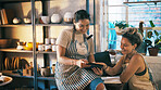 Reading, ceramic or team in store with tablet, creative insight or customer review in clay shop. Partnership, women or owners with tech, consumer feedback or design planning in pottery business.